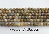 CAA5291 15.5 inches 6mm faceted round crazy lace agate beads wholesale