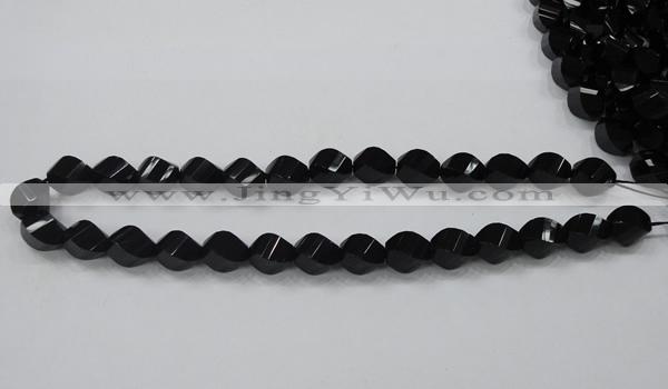CAB336 15.5 inches 10*14mm faceted & twisted rice black agate beads