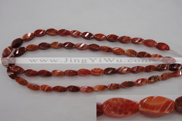 CAG4181 15.5 inches 7*14mm faceted & twisted rice natural fire agate beads