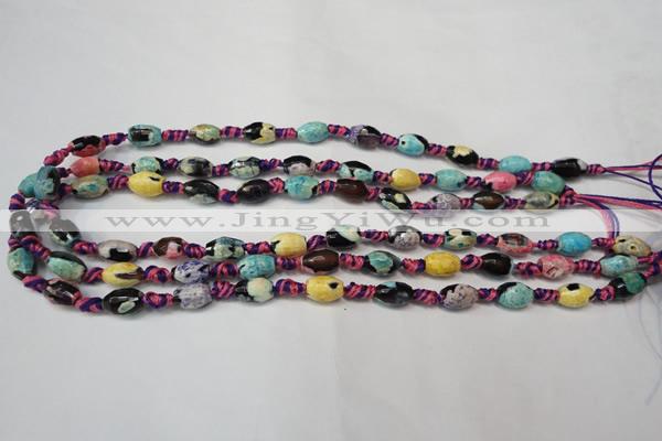 CAG5770 15 inches 6*9mm faceted rice fire crackle agate beads