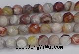 CAG9860 15.5 inches 4mm faceted round Mexican crazy lace agate beads