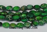 CDI178 15.5 inches 6*8mm oval dyed imperial jasper beads
