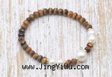 CFB768 faceted rondelle yellow tiger eye & potato white freshwater pearl stretchy bracelet