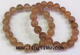 CGB4614 10mm - 11mm round golden rutilated quartz beaded bracelets