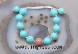 CGB9605 12mm round blue howlite & moonstone adjustable bracelets
