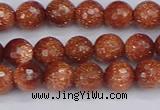 CGS471 15.5 inches 6mm faceted round goldstone beads wholesale