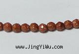 CGS88 15.5 inches 4mm faceted round goldstone beads wholesale