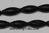 CNE15 15.5 inches 9*20mm carved rice black stone needle beads wholesale