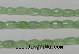 CRU165 15.5 inches 5*8mm faceted rice green rutilated quartz beads