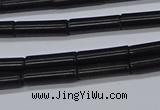 CTB318 15.5 inches 4*13mm tube black stone beads wholesale