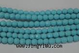 CTU1220 15.5 inches 4mm faceted round synthetic turquoise beads