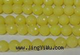 CTU2523 15.5 inches 4mm faceted round synthetic turquoise beads