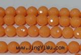 CTU2540 15.5 inches 6mm faceted round synthetic turquoise beads