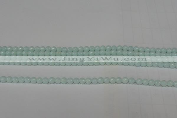CTU2563 15.5 inches 4mm round synthetic turquoise beads