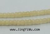 CYJ63 15.5 inches 6*7mm vase-shaped yellow jade gemstone beads wholesale